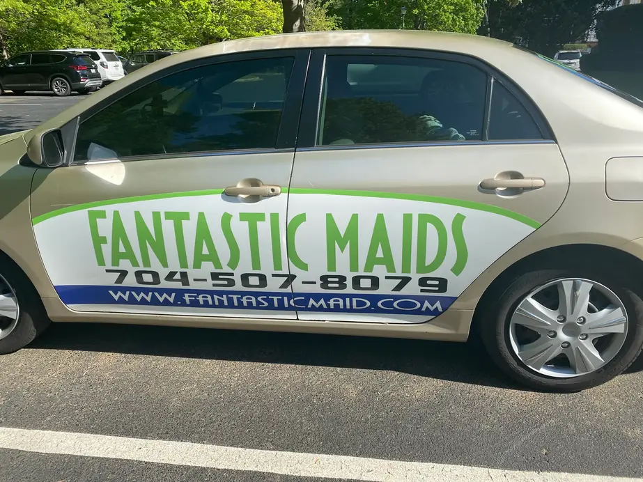 The Fantastic Maids wrapped company car parked in a lot